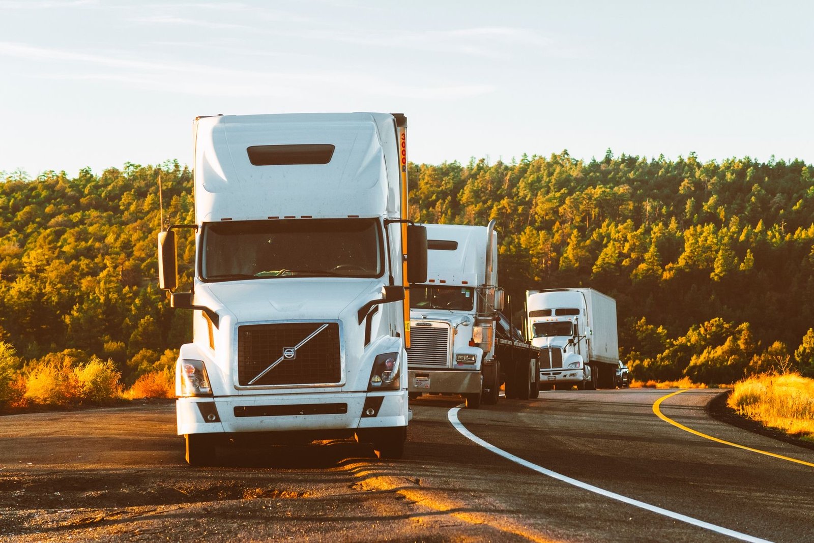 American class 8 trucks on a US highway